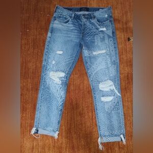 Distressed Lucky Brand Blue Jeans with Patterned Design